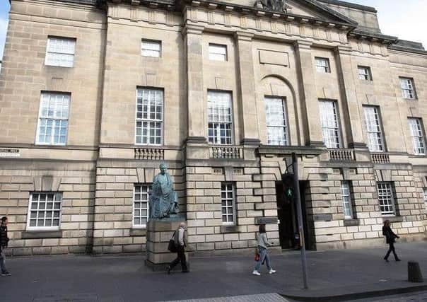 A 25-year-old Banff man is being tried in the High Court in Edinburgh over alleged terrorism offences