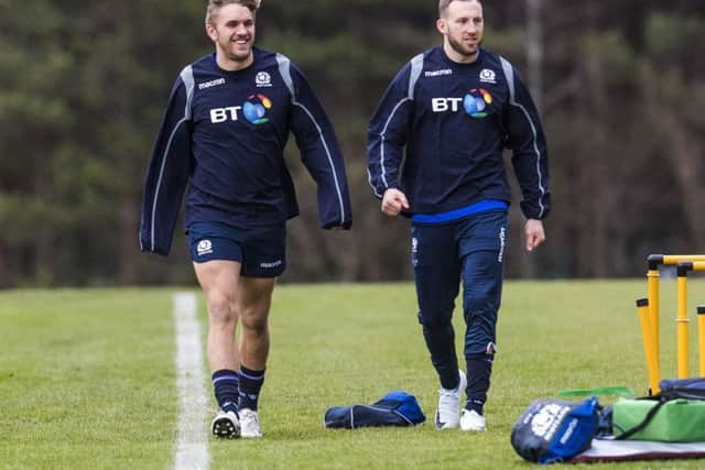 Chris Harris, left, with Byron McGuigan during a Scotland training session at the Oriam. Picture: SNS Group