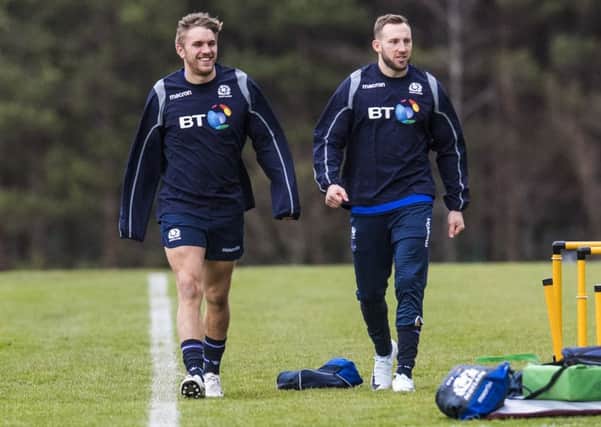 Chris Harris, left, with Byron McGuigan during a Scotland training session at the Oriam. Picture: SNS Group