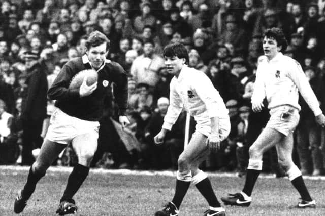 John Rutherford in action for Scotland against England's Rob Andrew during the 1986 Calcutta Cup win. Picture: Alan MacDonald
