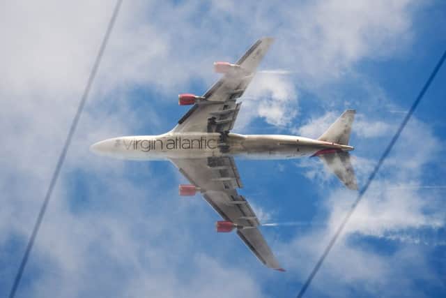 A Virgin Atlantic passenger plane comes into land at Heathrow Airport in west London. Picture: Leon Neal