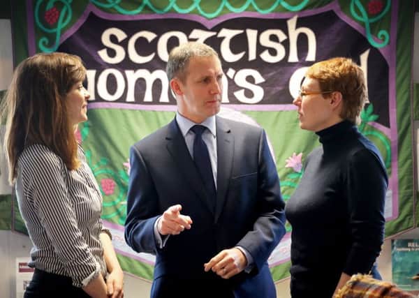 Justice Secretary Michael Matheson talks with Brenna Jessie (left) external affairs officer and Asia Kinross, administrator of Scottish Women's Aid. Picture: Jane Barlow/PA Wire