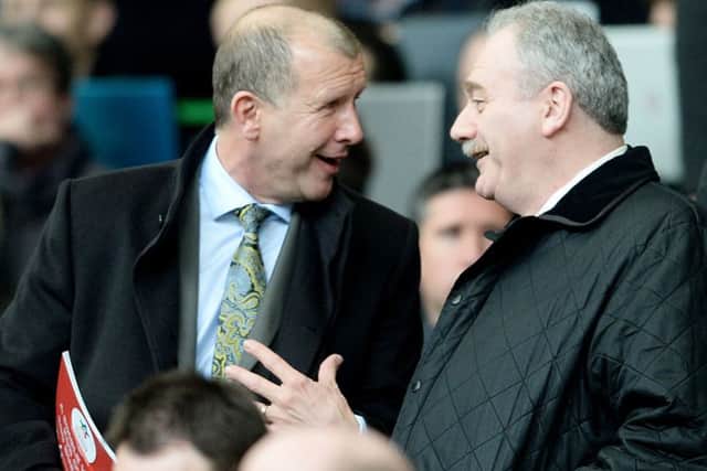 Regan pictured with SFA vice-president and chairman of Hibs Rod Petrie. Picture: SNS Group