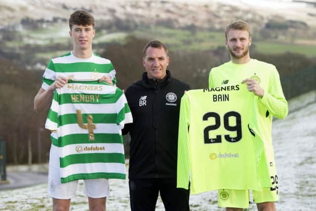 Celtic manager Brendan Rodgers (centre) unveils his new signings Jack Hendry (left) and Scott Bain. Picture: SNS Group