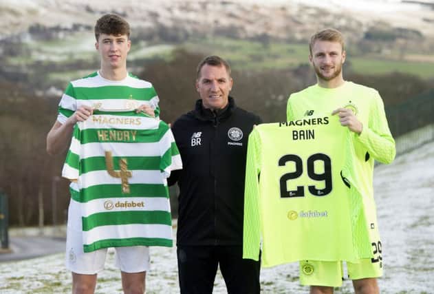 Celtic manager Brendan Rodgers (centre) unveils his new signings Jack Hendry (left) and Scott Bain. Picture: SNS Group