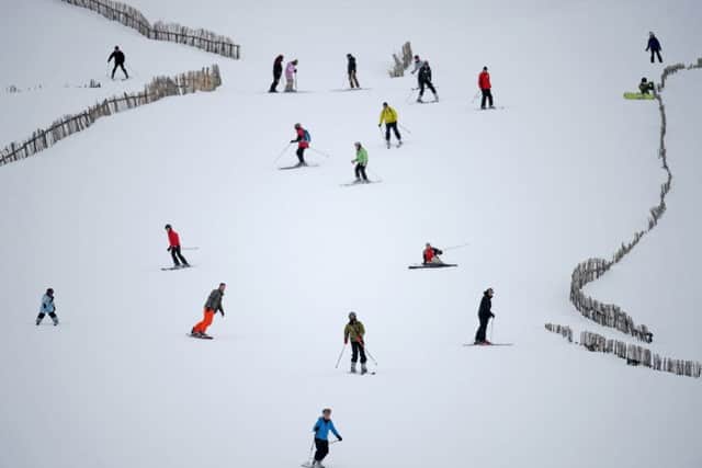 Skiers and snowboarders enjoy the recent snowfall at Glenshee ski centre.  (Photo by Jeff J Mitchell/Getty Images)