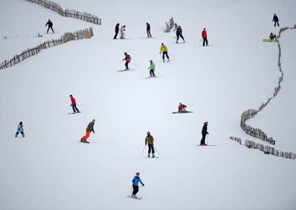 Skiers and snowboarders enjoy the recent snowfall at Glenshee ski centre.  (Photo by Jeff J Mitchell/Getty Images)