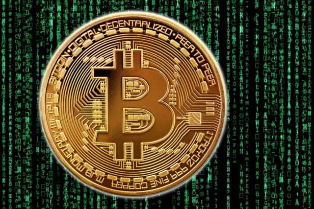 A 3d rendering of a gold Bitcoin