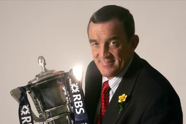 The legendary Phil Bennett with the Six Nations trophy.