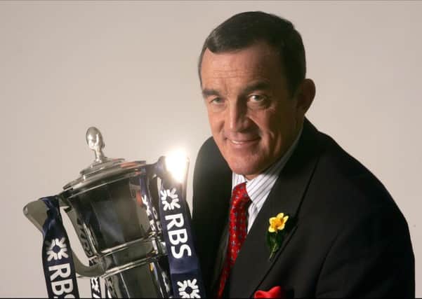 The legendary Phil Bennett with the Six Nations trophy.