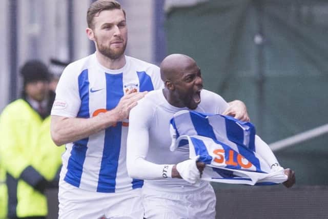Youssouf Mulumbu (right) celebrates after giving Kilmarnock the lead. Picture: PA