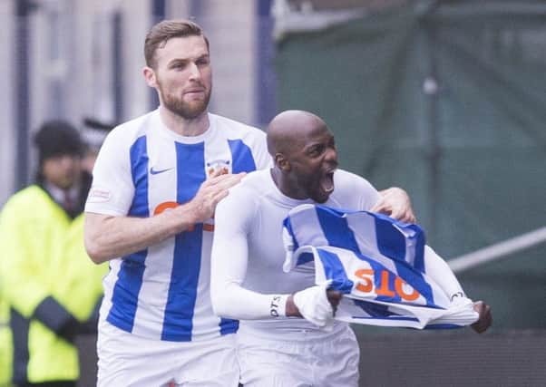 Youssouf Mulumbu (right) celebrates after giving Kilmarnock the lead. Picture: PA
