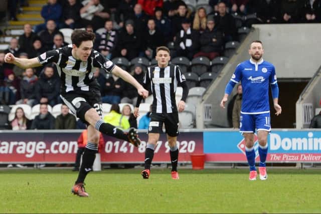 Liam Smith fires Championship leaders St Mirren into the lead against Queen of the South. Photograph: SAMMY TURNER/SNS