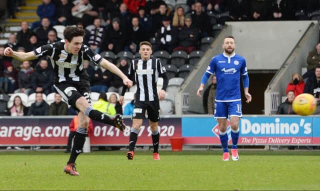 Liam Smith fires Championship leaders St Mirren into the lead against Queen of the South. Photograph: SAMMY TURNER/SNS