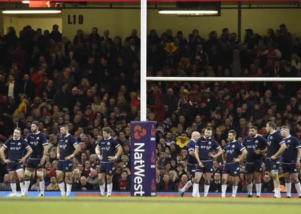 Dejected Scotland players behind the try line. Picture: Ian Rutherford