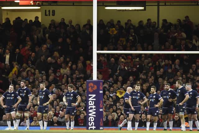 Dejected Scotland players behind the try line. Picture: Ian Rutherford