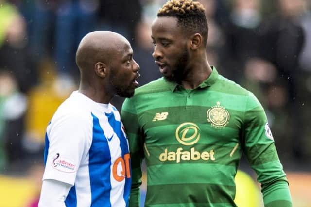 Youssouf Mulumbu and Moussa Dembele exchange words during Kilmarnock's victory over Celtic. Picture: SNS