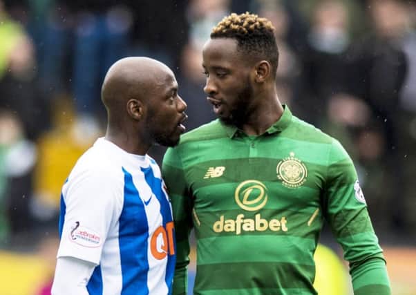 Youssouf Mulumbu and Moussa Dembele exchange words during Kilmarnock's victory over Celtic. Picture: SNS