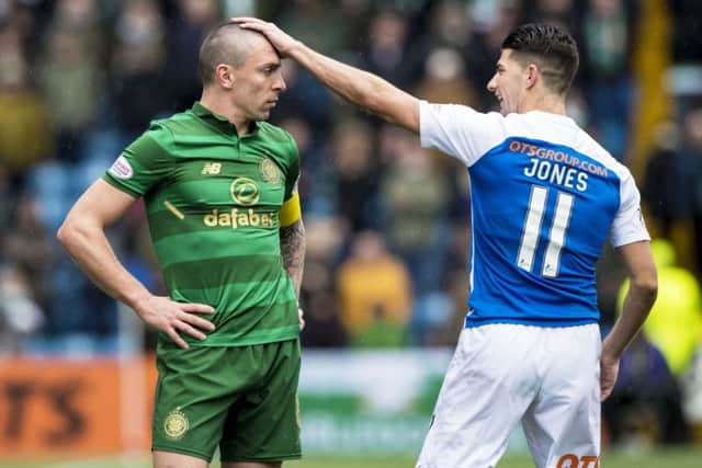Celtic's Scott Brown (L) with Kilmarnock's Jordan Jones. Picture: SNS/Alan Harvey