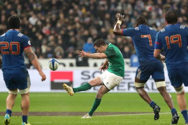 Ireland's Jonny Sexton scores the winning drop goal at the Stade de France with the final kick of the game. Picture: Gareth Fuller/PA