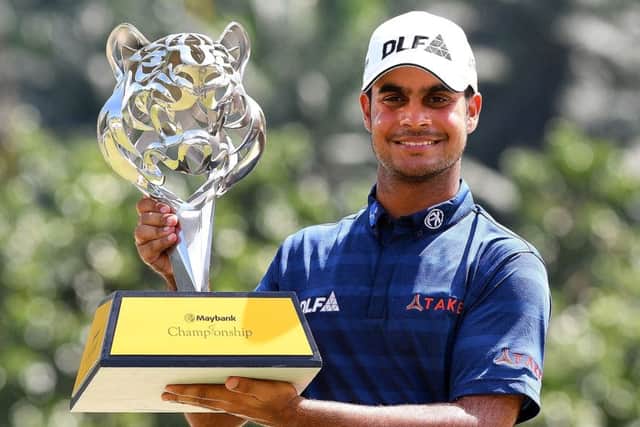 India's Shubhankar Sharma shows off the trophy after winning the Maybank Championship in Malaysia. Picture: Getty Images