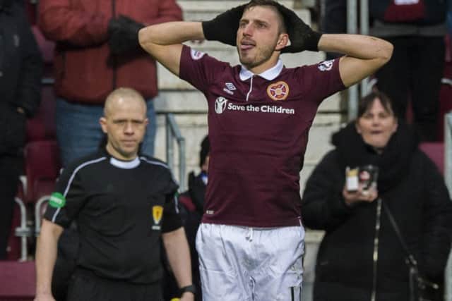 David Milinkovic celebrates scoring the goal which gave Hearts victory over St Johnstone. Picture: SNS.
