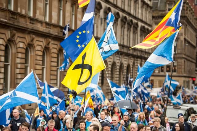 Pro-independence marchers make their way through Glasgow in September 2017. Picture: John Devlin