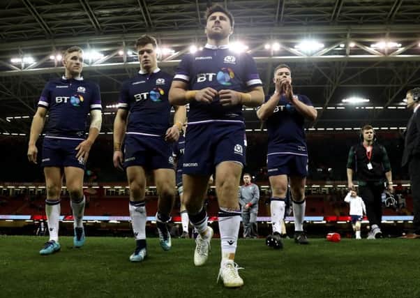A dejected Scotland team leave the field at full-time after their 34-7 drubbing by Wales on Saturday. Picture: Getty.