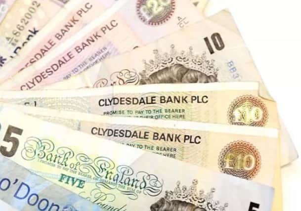 Scots are being urged to spend or exchange their £5 and £10 notes before 1 March. Picture: TSPL