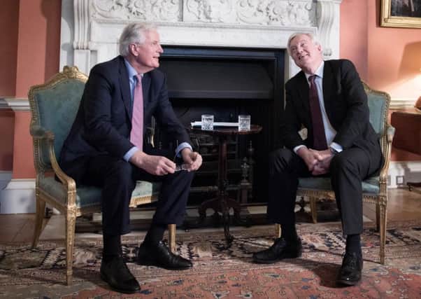 Michel Barnier with Brexit Secretary David Davis at 10 Downing Street. Picture: Stefan Rousseau/PA Wire
