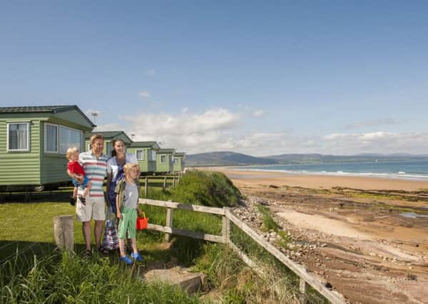 Family fun at Grannie's Heilan' Hame Holiday Park, overlooking Embo beach.