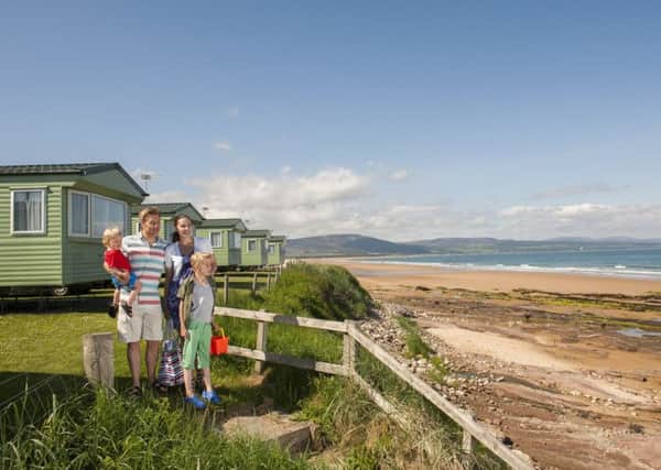Family fun at Grannie's Heilan' Hame Holiday Park, overlooking Embo beach.