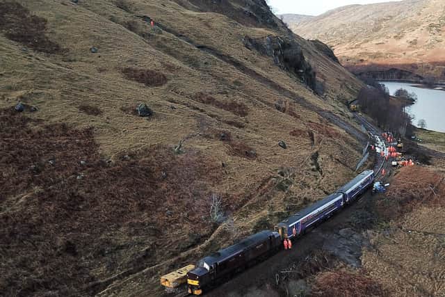 The derailed train being recovered by a rescue locomotive. Picture: Network Rail