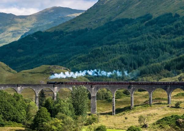A special train travels over the famous Glenfinnan viaduct (Hogwarts Express)