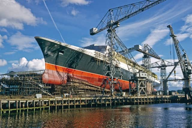 The QE2, the liner whose striking style came to define the Sixties, under construction on the Clyde.