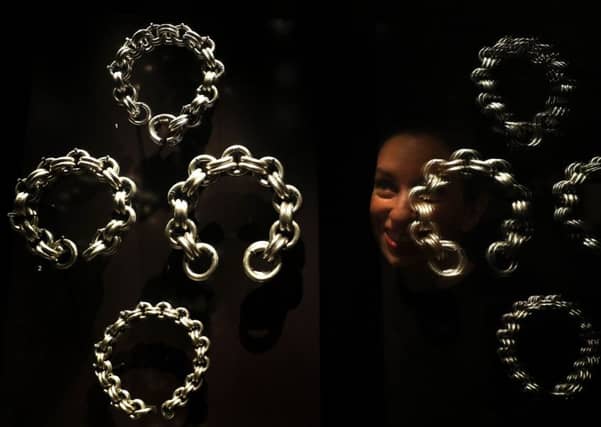 Alice Wyllie from the National Museums of Scotland views "Conspicuous consumption" Picture: Andrew Milligan/PA Wire
