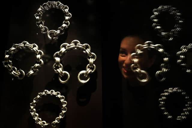 Alice Wyllie from the National Museums of Scotland views "Conspicuous consumption" Picture: Andrew Milligan/PA Wire