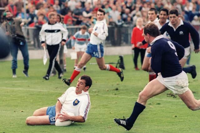 French scrum half Pierre Berbizier scores a try against Scotland at the 1987 Rugby World Cup. Picture: AFP/Getty Images