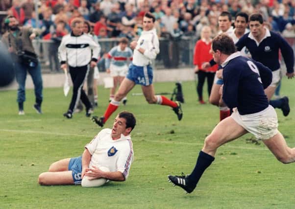 French scrum half Pierre Berbizier scores a try against Scotland at the 1987 Rugby World Cup. Picture: AFP/Getty Images