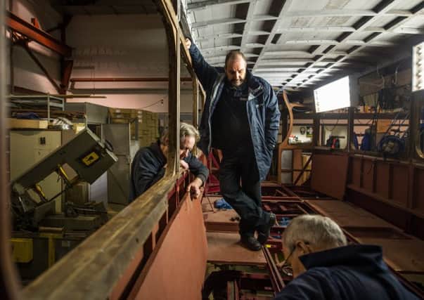 Retired engineers at Summerlee Museum of Scottish Industrial Life are restoring the tram to its former glory. Picture: John Devlin