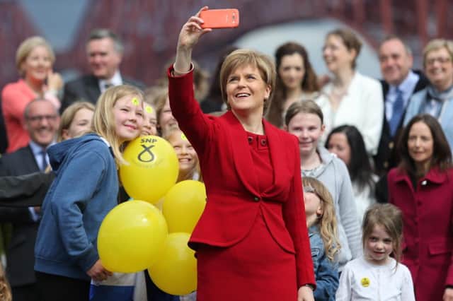 Nicola Sturgeon takes a selfie at a post-general election event in 2015, when her party returned 56 MPs. Picture: Alistair Pryde/JP Resell