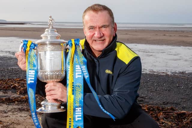 Former Rangers player and Ayr boss Gordon Dalziel with the Scottish Cup.