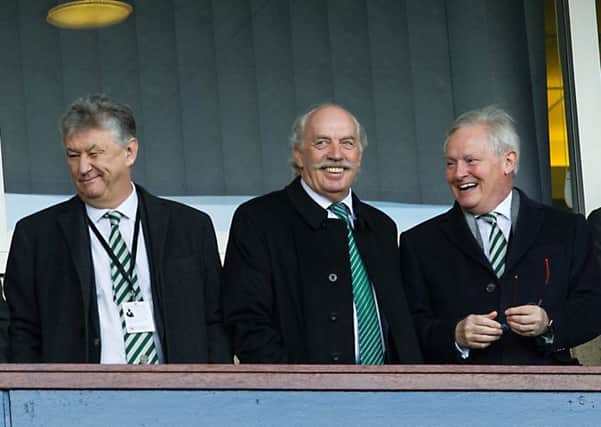 Celtic chairman Ian Bankier, right, with chief executive Peter Lawwell, left, and major shareholder Dermot Desmond, centre. Picture: John Devlin