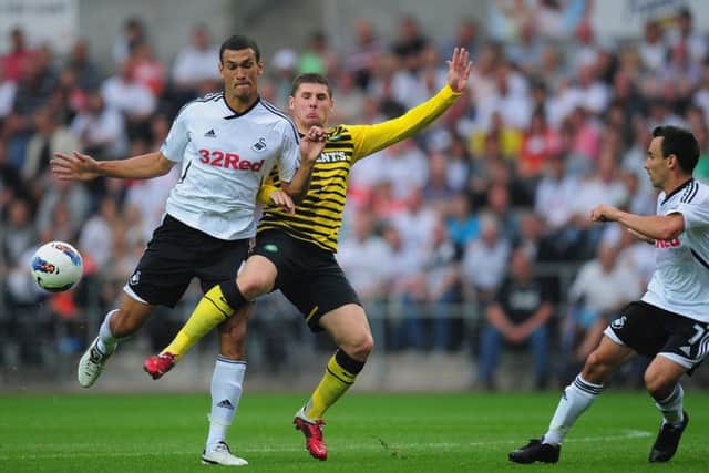 Steven Caulker in action for Swansea City against Celtic in a 2012 pre-season friendly. Picture: Getty Images