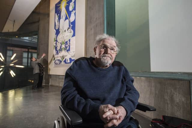 Alasdair Gray with his reworked mural, which was originally a private commission in 1965. The print is on display at The Lighthouse gallery. Picture: John Devlin/TSPL