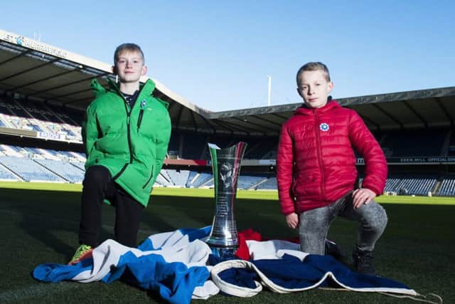 Lachlan Ross (left) and Romain Cabanis will unveil the trophy to the Murrayfield crowd ahead of kick-off. Picture: SNS Group