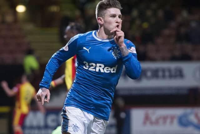 Rangers' Josh Windass gestures towards his own fans after scoring the opener against Partick Thistle. Picture: SNS