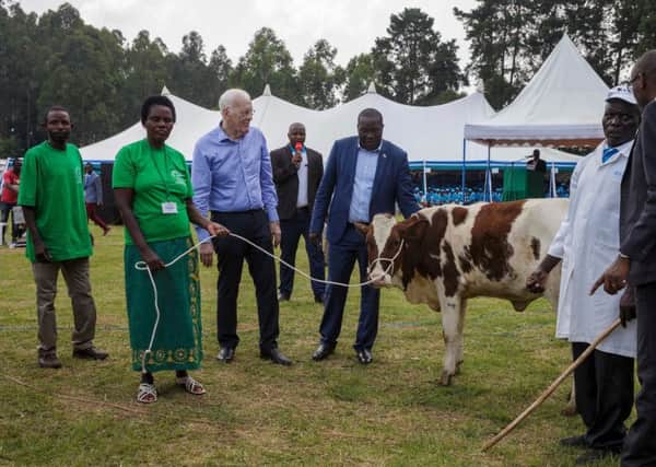 Guest of honour Sir Ian Wood greets farmers with their livestock and officials. Ross Johnston/Newsline Media/TWFA