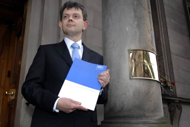 Professor Anton Muscatelli in March 2009 with the published report by the group established to advise the Calman Commission on financial accountability. Picture: Jane Barlow