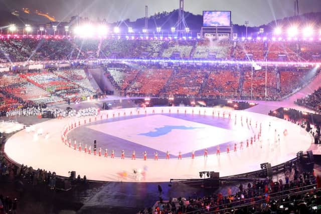 The Unified Korea delegation parades. Picture: Sean M. Haffey/AFP/Getty Images